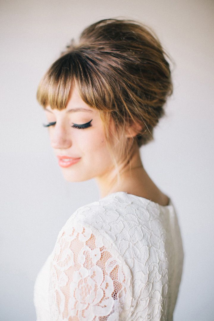 Light Brown Updo With Voluminous Blunt Bangs — And The Hair Appears To Be Medium Length Light Brown Updo With Voluminous Blunt Bangs — And The Hair Appears To Be Medium Length — Wedding Bangs 2027