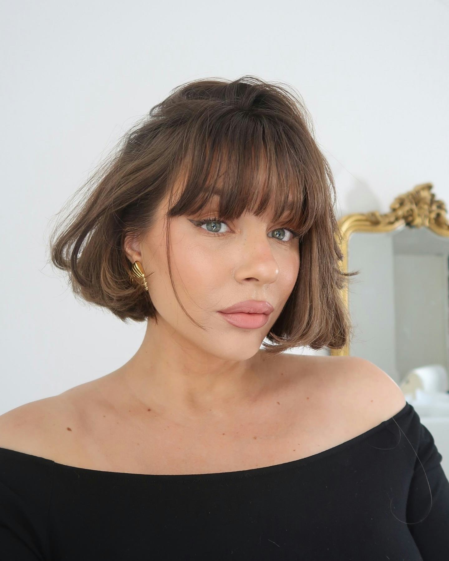 Voluminous Ash Blonde Bob With Flipped Ends Voluminous Ash Blonde Bob With Flipped Ends — Spring Haircuts 2027