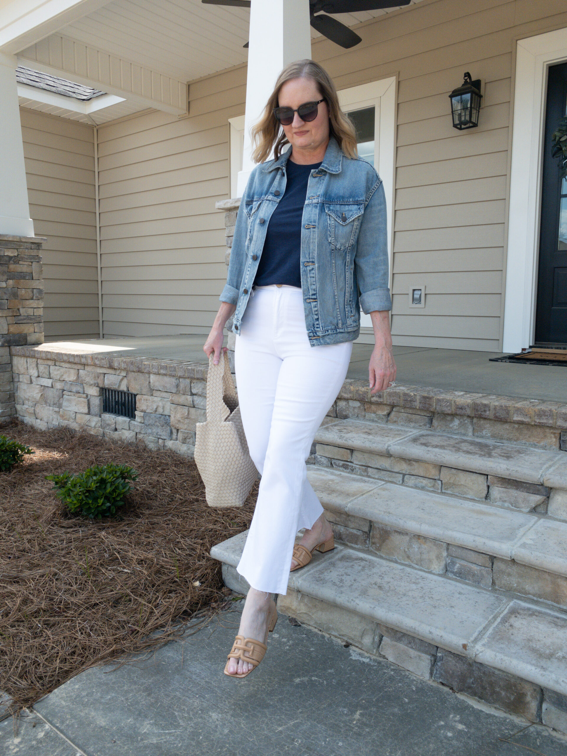 White Flare Jeans Layered with a Light Wash Denim Jacket and Navy T-Shirt White Flare Jeans Layered with a Light Wash Denim Jacket and Navy T-Shirt — Spring Outfits 2027 with Jeans