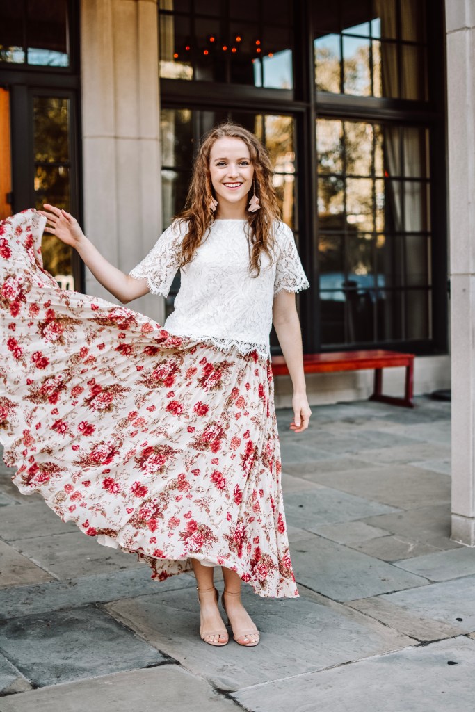 Floral Print Pleated Skirt with White Lace Top and Nude Sandals — Pleated Skirt Outfits 2027