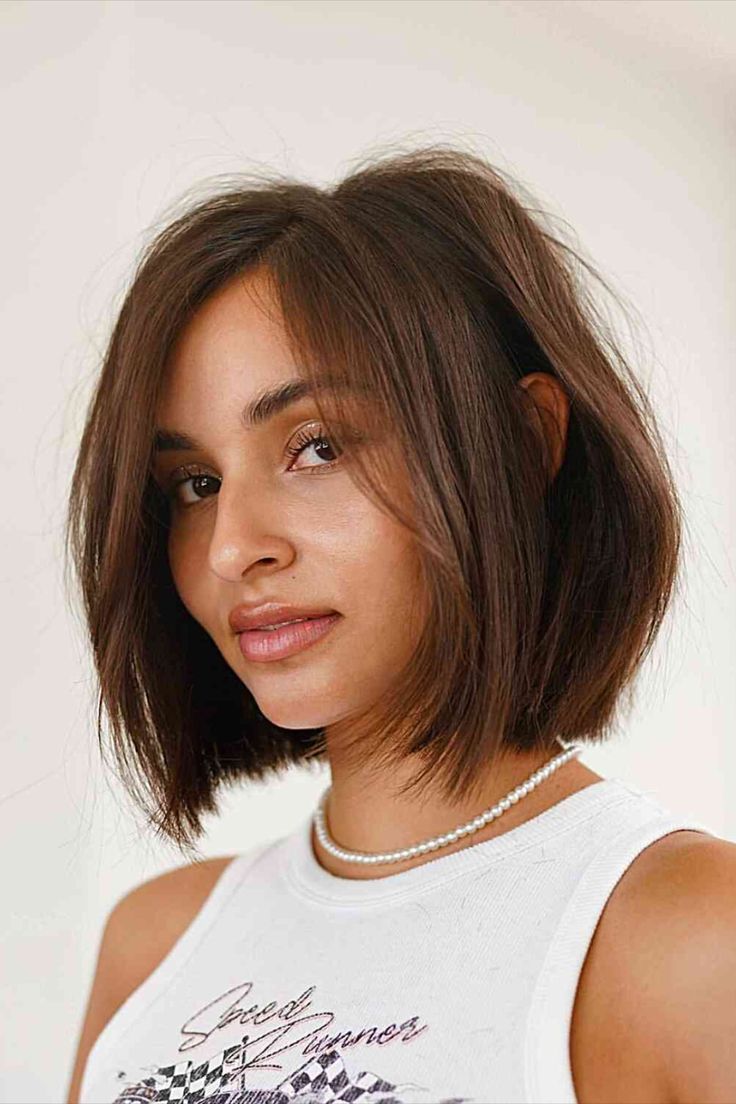 Chin Bob With Face-Framing Layers Chin Bob With Face-Framing Layers — Classic Bob 2027