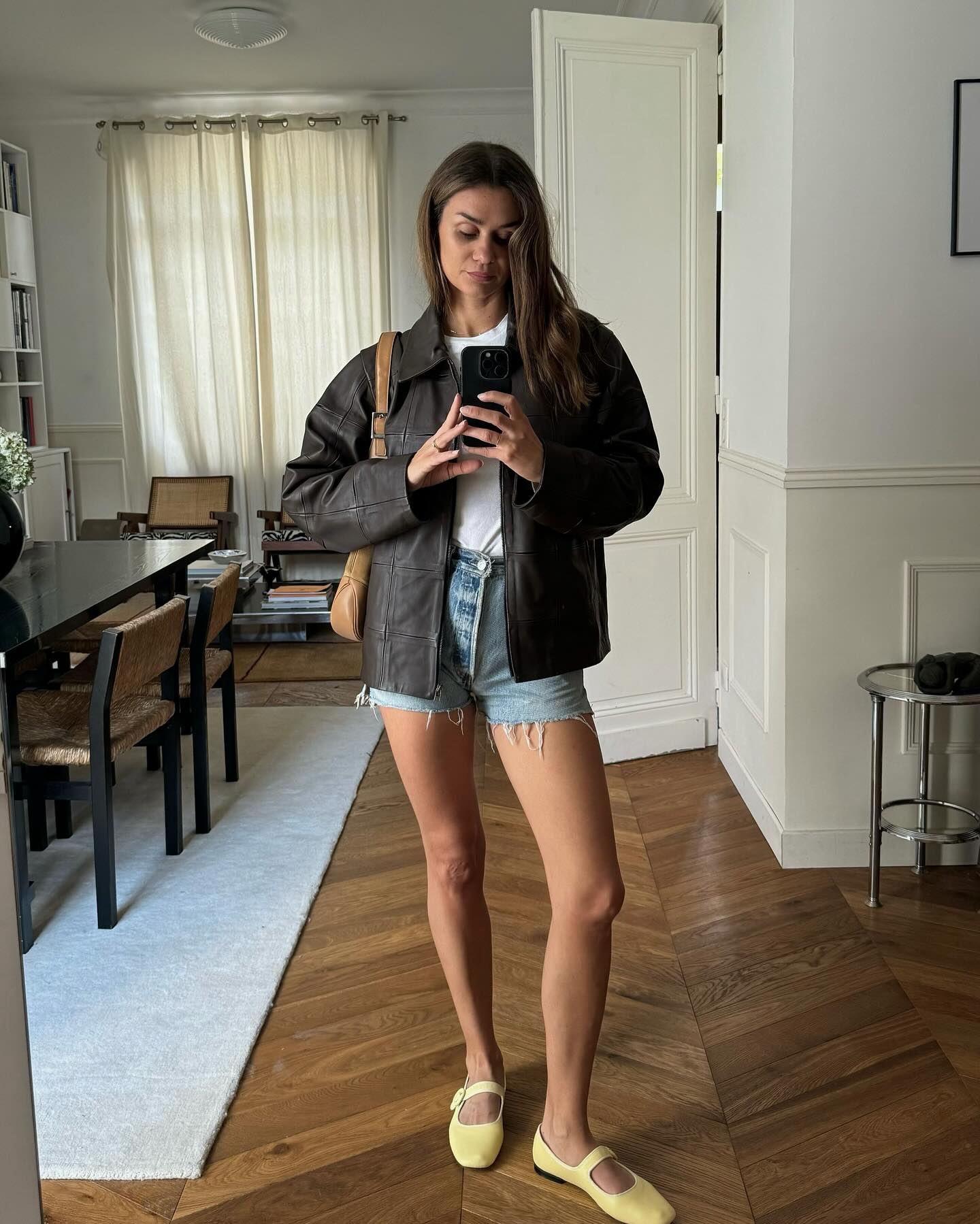 Light Wash Distressed Denim Shorts and Dark Leather Jacket Light Wash Distressed Denim Shorts and Dark Leather Jacket — Jean Shorts Outfits 2027