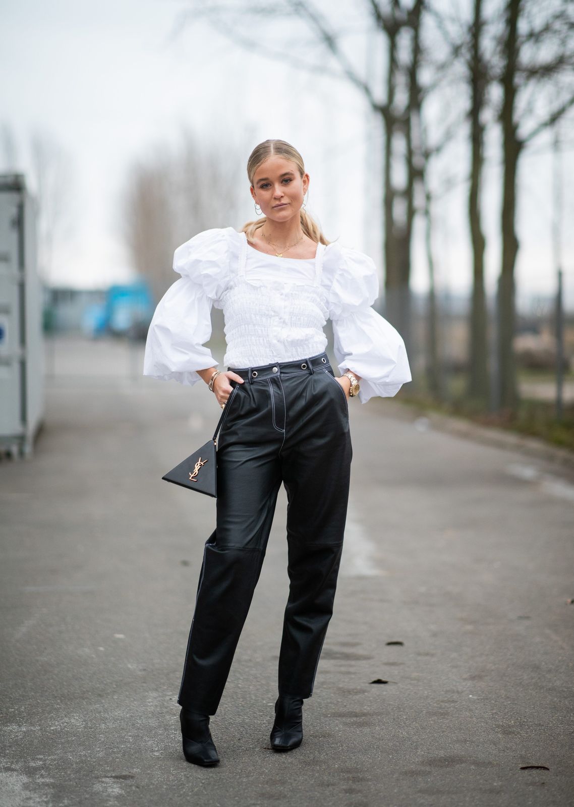 White Puff Sleeve Blouse with Smocked Bodice and Black Leather-Look Trousers White Puff Sleeve Blouse with Smocked Bodice and Black Leather-Look Trousers — Puff Sleeve Blouse Outfits 2027