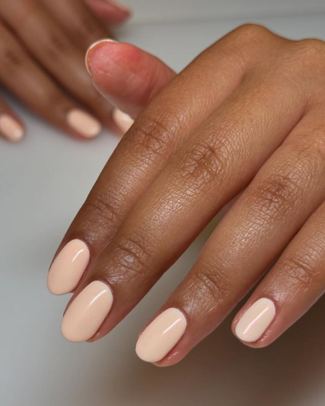 Peachy-Pink Glossy Short Oval Nails — Pastel Nails 2027 for Dark Skin