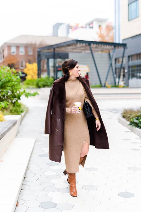 Brown Faux Fur Trimmed Coat Over Beige Knit Dress for Winter Sophistication — Dressy Winter Outfits 2027
