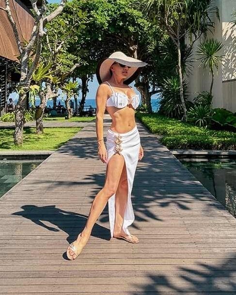 White Bikini with Embellished Sarong and Wide-Brimmed Hat White Bikini with Embellished Sarong and Wide-Brimmed Hat — Pool Party Outfits 2027