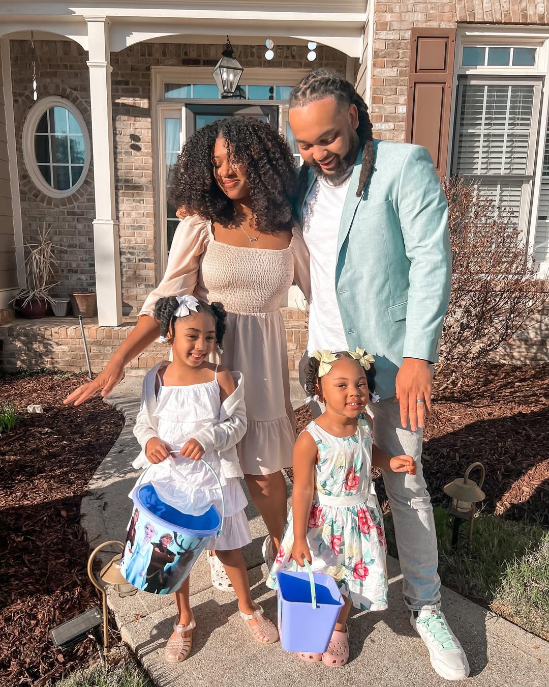 Pastel Perfection: Cream Smocked Dress and Floral Accents for Easter — Easter Family Photo Outfits 2027