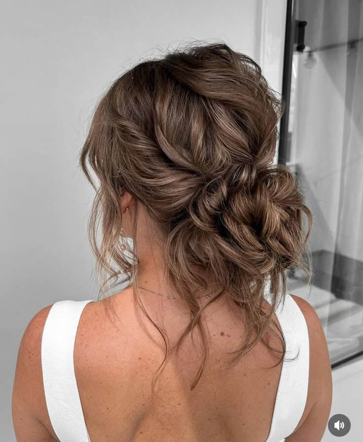 Light Brown Messy Bun With Balayage Highlights Light Brown Messy Bun With Balayage Highlights — Formal Hairstyles 2027