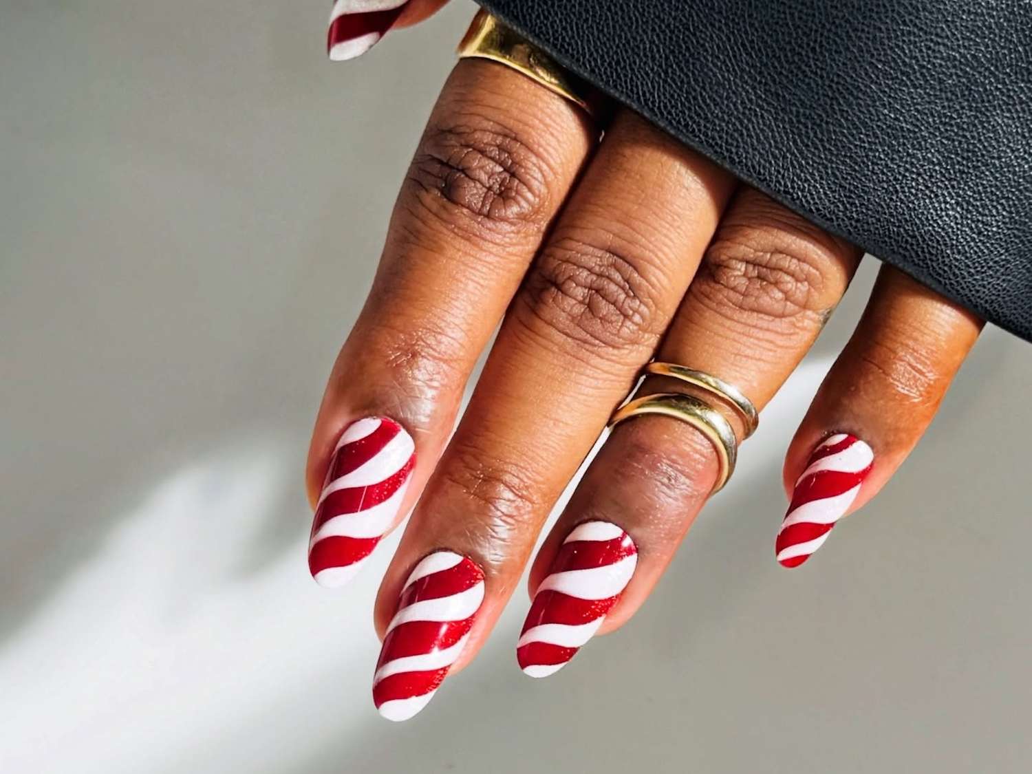 Bold Candy Cane Stripe Almonds Bold Candy Cane Stripe Almonds — Christmas Acrylic Nails 2026