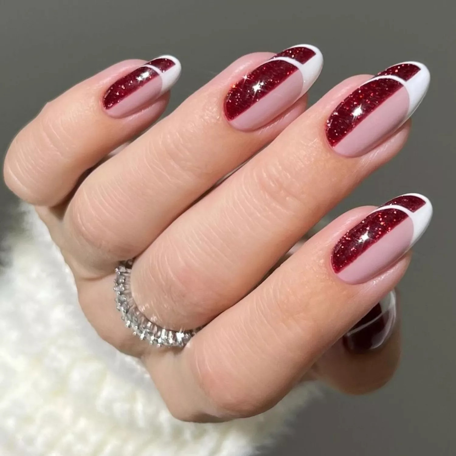 Nude French with Red Glitter Accent Nude French with Red Glitter Accent — Winter Gel Nail Colors 2027