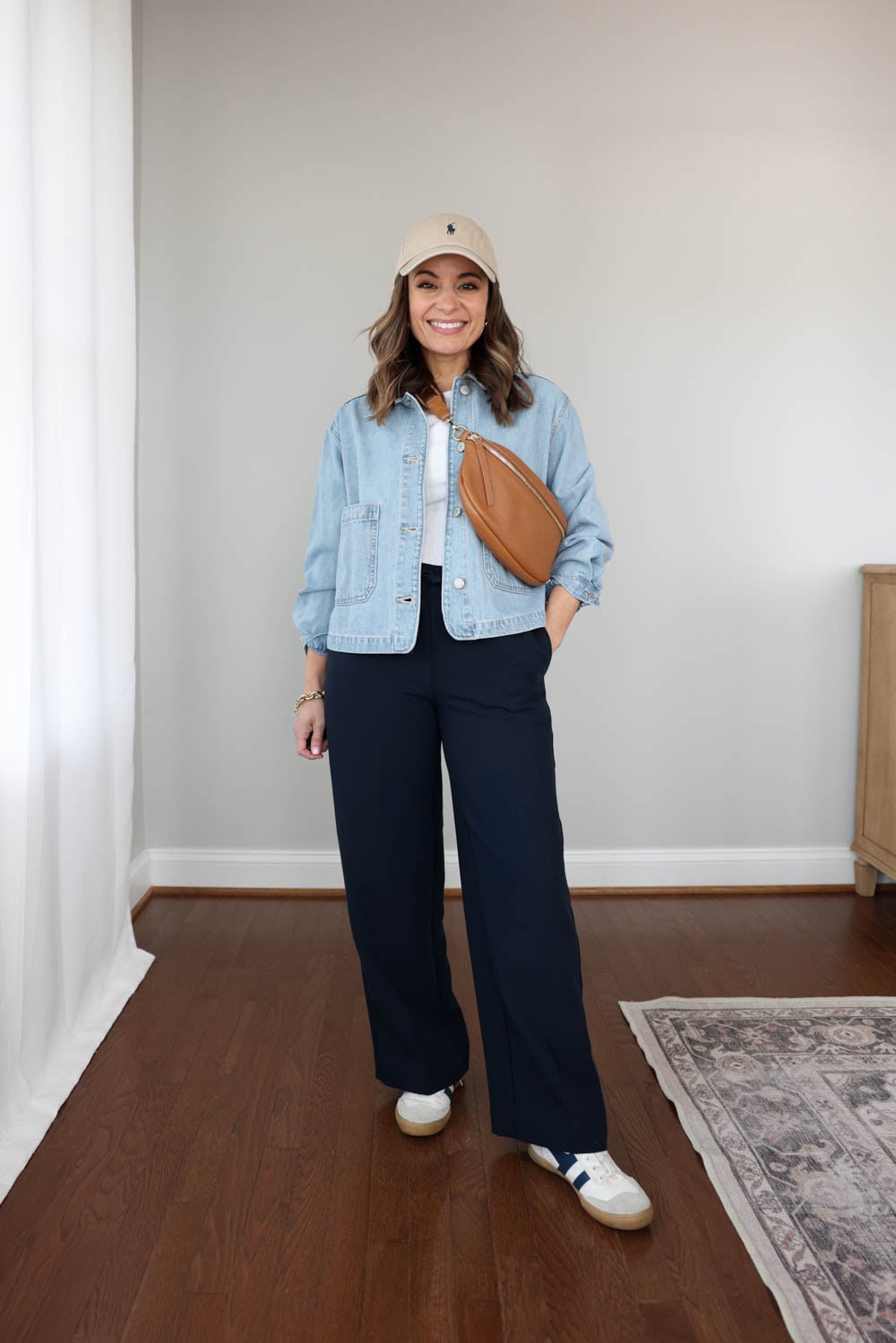 Light Wash Cropped Jacket with Navy Trousers and Sneakers — Denim Jacket Outfits 2027