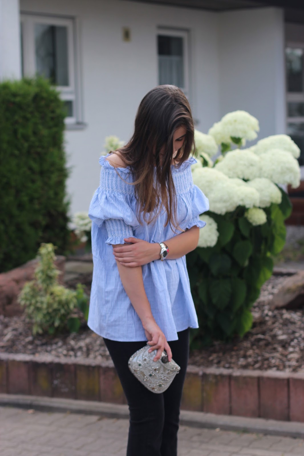 Striped Off-Shoulder Blouse with Smocked Details and Black Pants — Off the Shoulder Top Outfits 2027