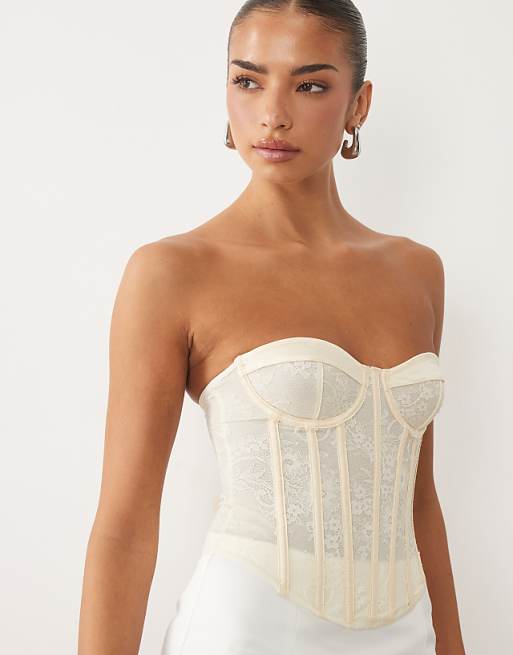 Cream Lace Corset with White Trousers for a Clean Look Cream Lace Corset with White Trousers for a Clean Look — Lace Corset Top Outfits 2027