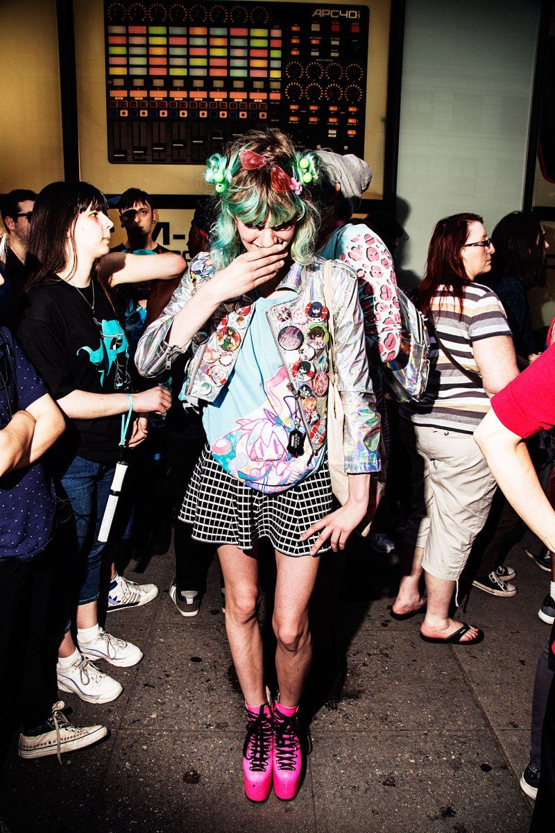 Iridescent Jacket Over Graphic Tee and Patterned Skirt — Concert Outfits 2027