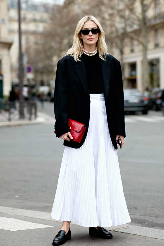 Black Blazer and White Pleated Skirt with Red Clutch for Dressy Appeal — Dressy Winter Outfits 2027