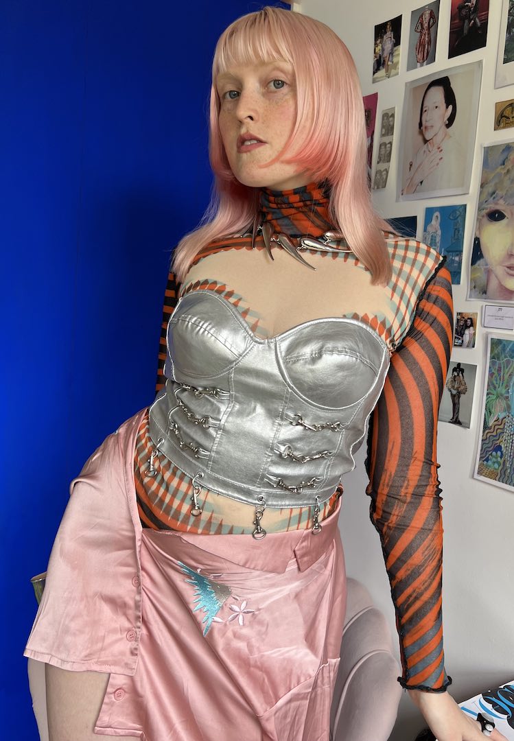 Edgy Layers: Silver Metallic Bustier with Plaid Mesh — Metallic Outfits 2027
