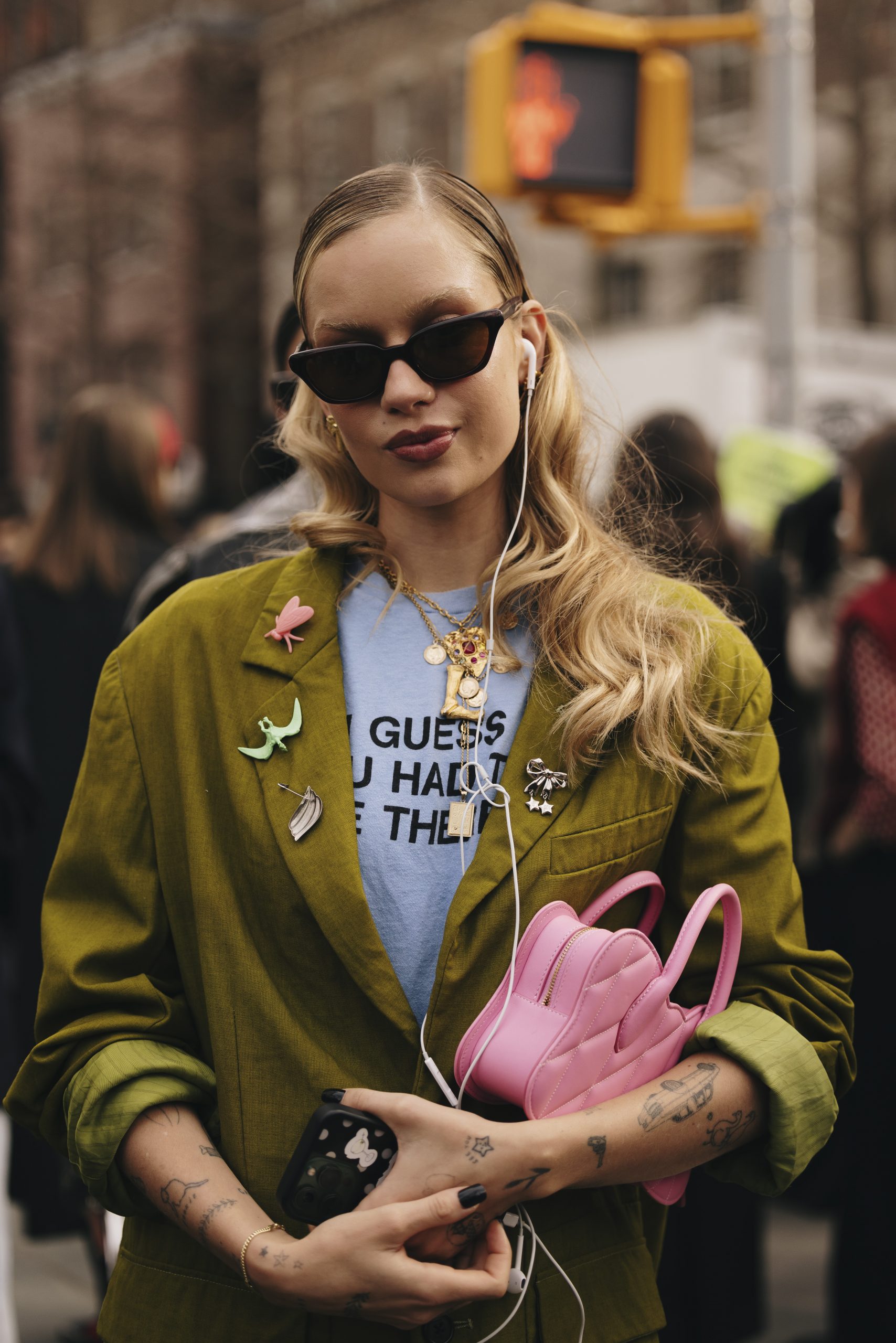 Playful Street Style: Multiple Colorful Brooches on an Olive Jacket Playful Street Style: Multiple Colorful Brooches on an Olive Jacket — Brooch Outfits 2027