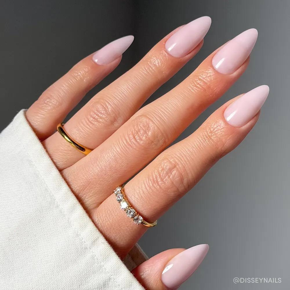 Warm Milky Light Pink Glossy Almonds Warm Milky Light Pink Glossy Almonds — Long Almond Pink Nails Ideas 2027