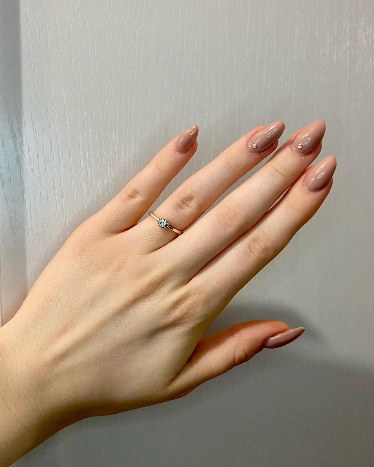 Three Small Rhinestones On Accent Nail Visual Idea Three Small Rhinestones On Accent Nail Visual Idea — Nude Nails 2027 for Mature Hands