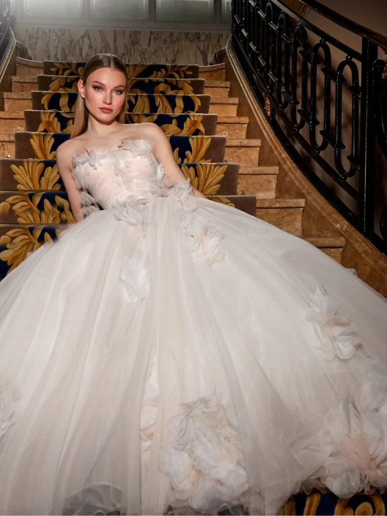Floral Appliqués: Ivory and Blush Pink Ballgown — Wedding Dress Trends 2027