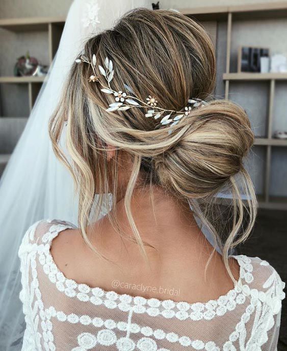 Messy Updo With Floral Accessory Messy Updo With Floral Accessory — Sweet 16 Hairstyles 2027