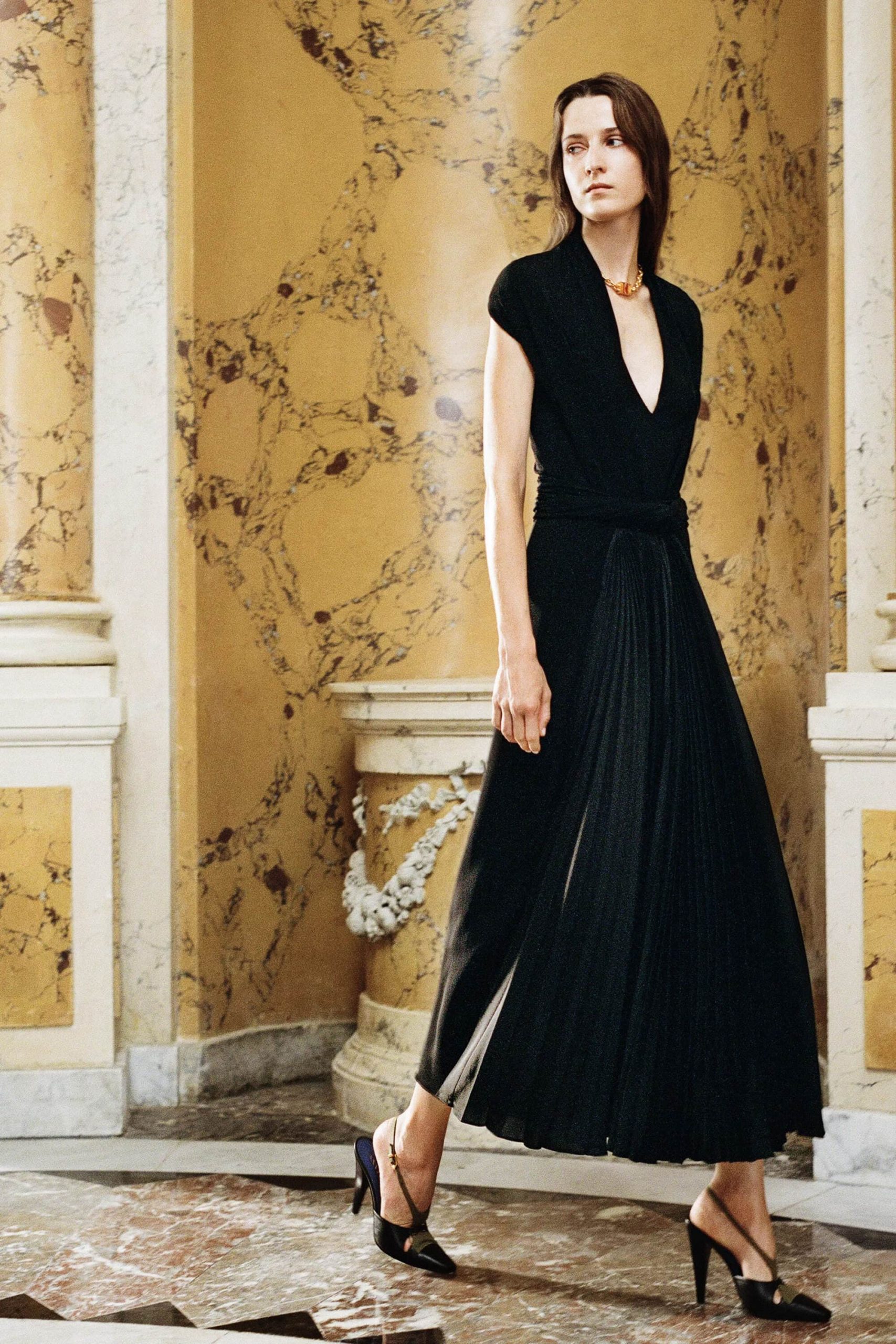 Wrap Bodice Pleated Skirt: Black Midi Dress with Gold Necklace Wrap Bodice Pleated Skirt: Black Midi Dress with Gold Necklace — Midi Dresses 2027