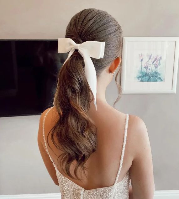Dark Brown Ponytail With Satin Bow — Ponytail Bachelorette Hairstyles 2027