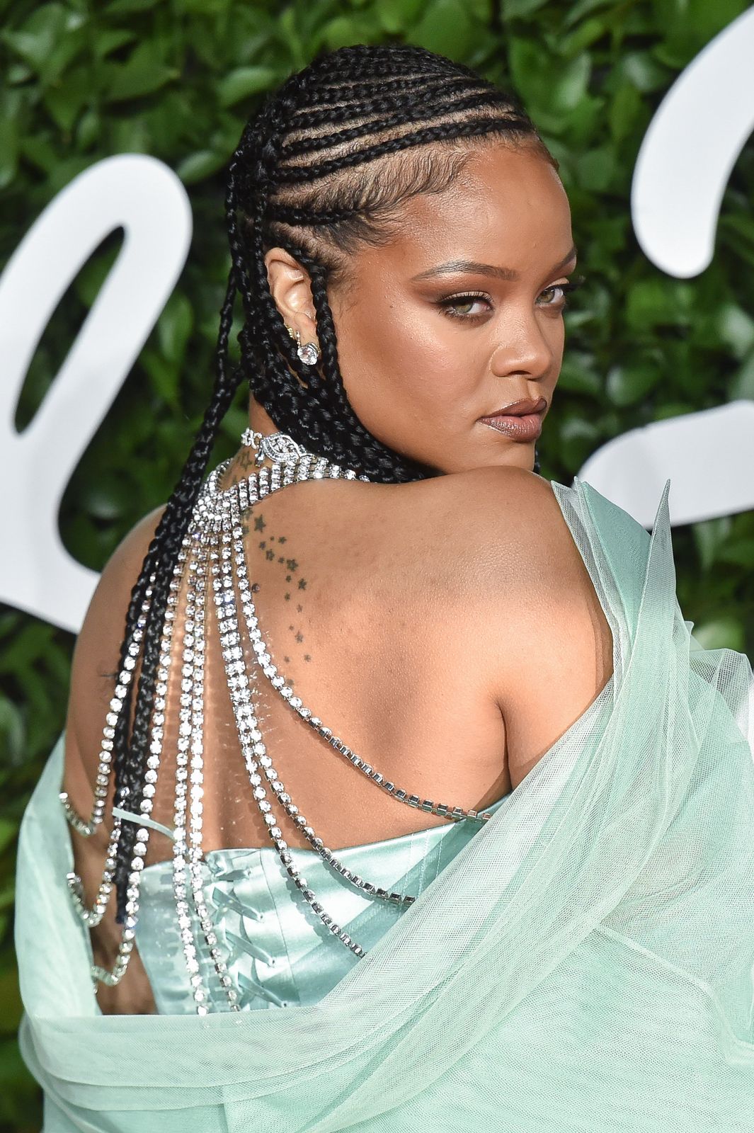 Cornrows With Chain Embellishments Cornrows With Chain Embellishments — Protective Vacation Hairstyles 2027