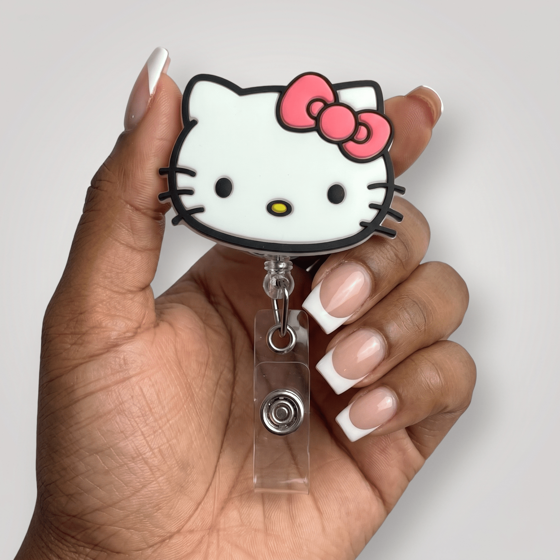 Medium Square French Hello Kitty Badge Reel Medium Square French Hello Kitty Badge Reel — Nurse Nails 2027