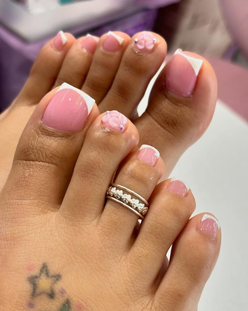 3D Floral Accents on French Tips 3D Floral Accents on French Tips — Light Pink Toe Nails 2027