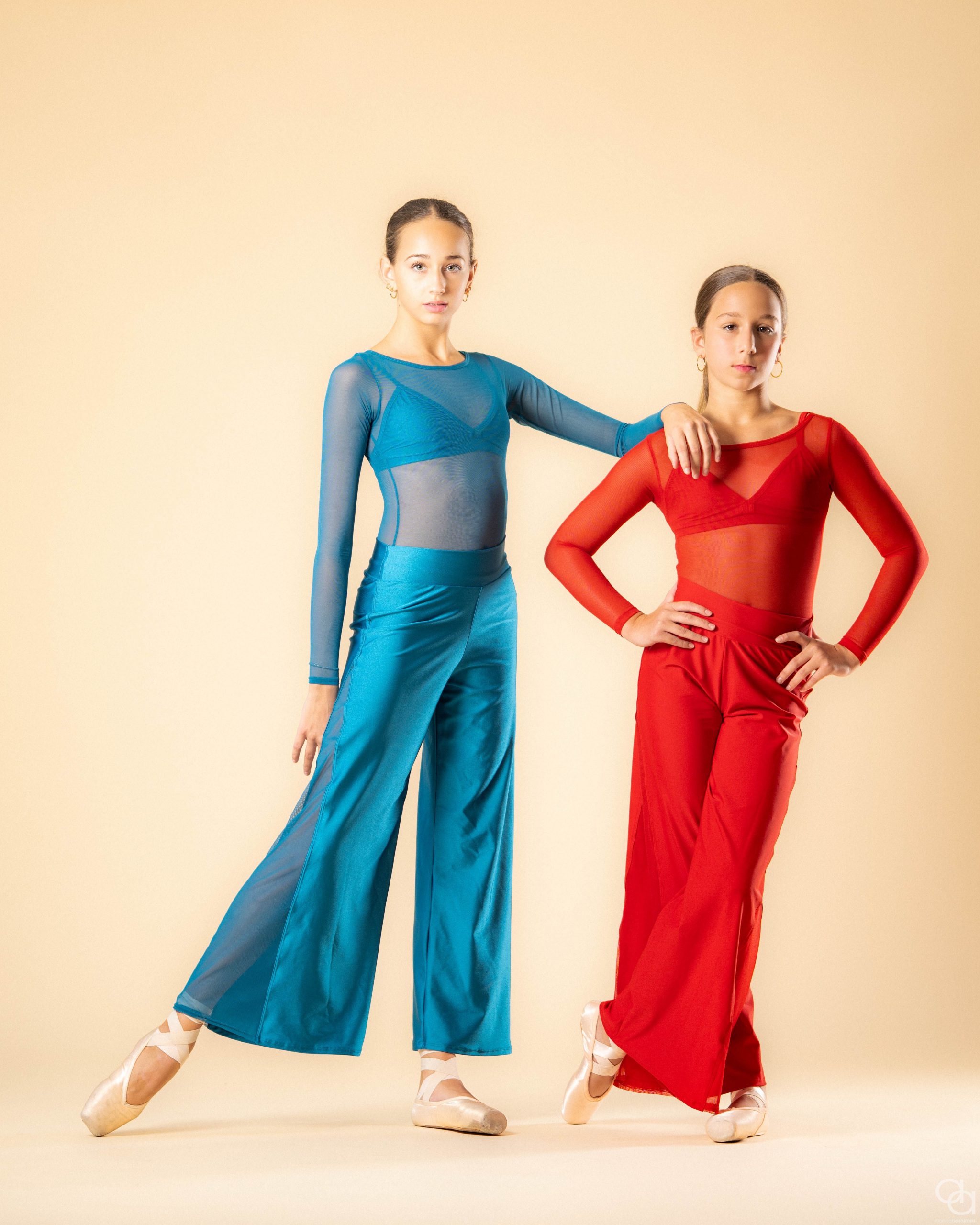 Contrasting Hues: Teal and Red Mesh Tops with Wide-Leg Pants Contrasting Hues: Teal and Red Mesh Tops with Wide-Leg Pants — Dance Outfits 2027
