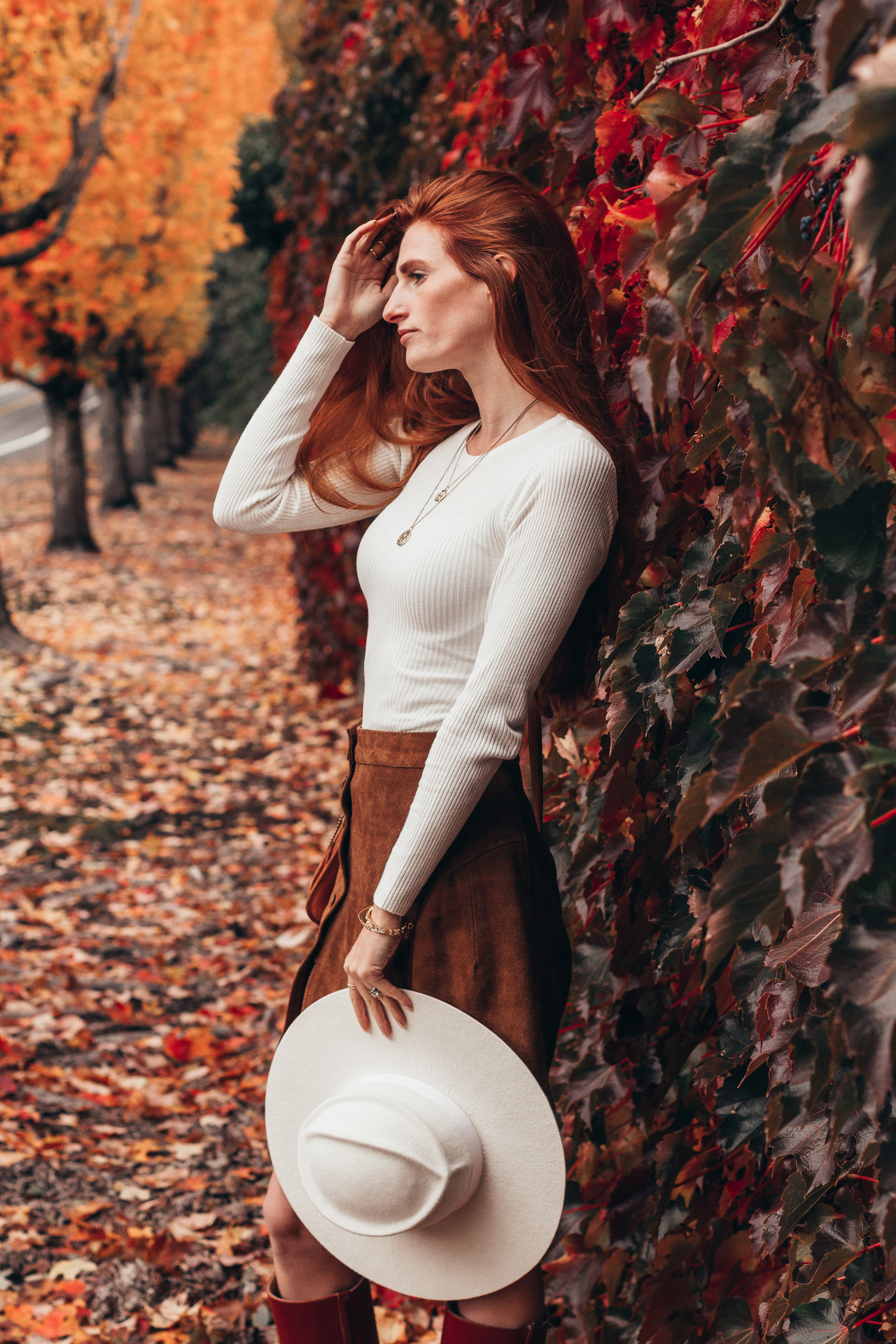 Suede A-line Skirt with a Contrasting White Top and Red Boots Suede A-line Skirt with a Contrasting White Top and Red Boots — Brown Outfits 2027