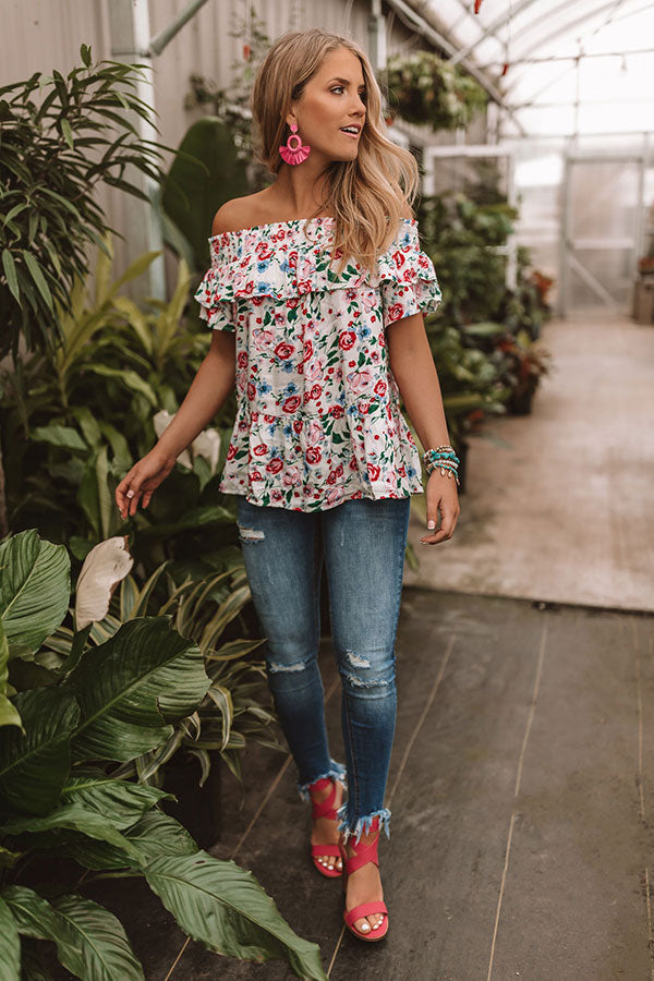 Floral Ruffled Off-Shoulder Peplum Top with Ripped Skinny Jeans — Off the Shoulder Top Outfits 2027
