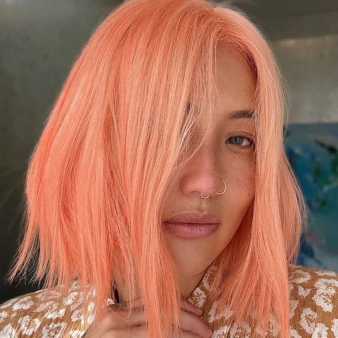 Vibrant Peach Bob With Blunt Bangs Vibrant Peach Bob With Blunt Bangs — Peach Blonde Hair 2027