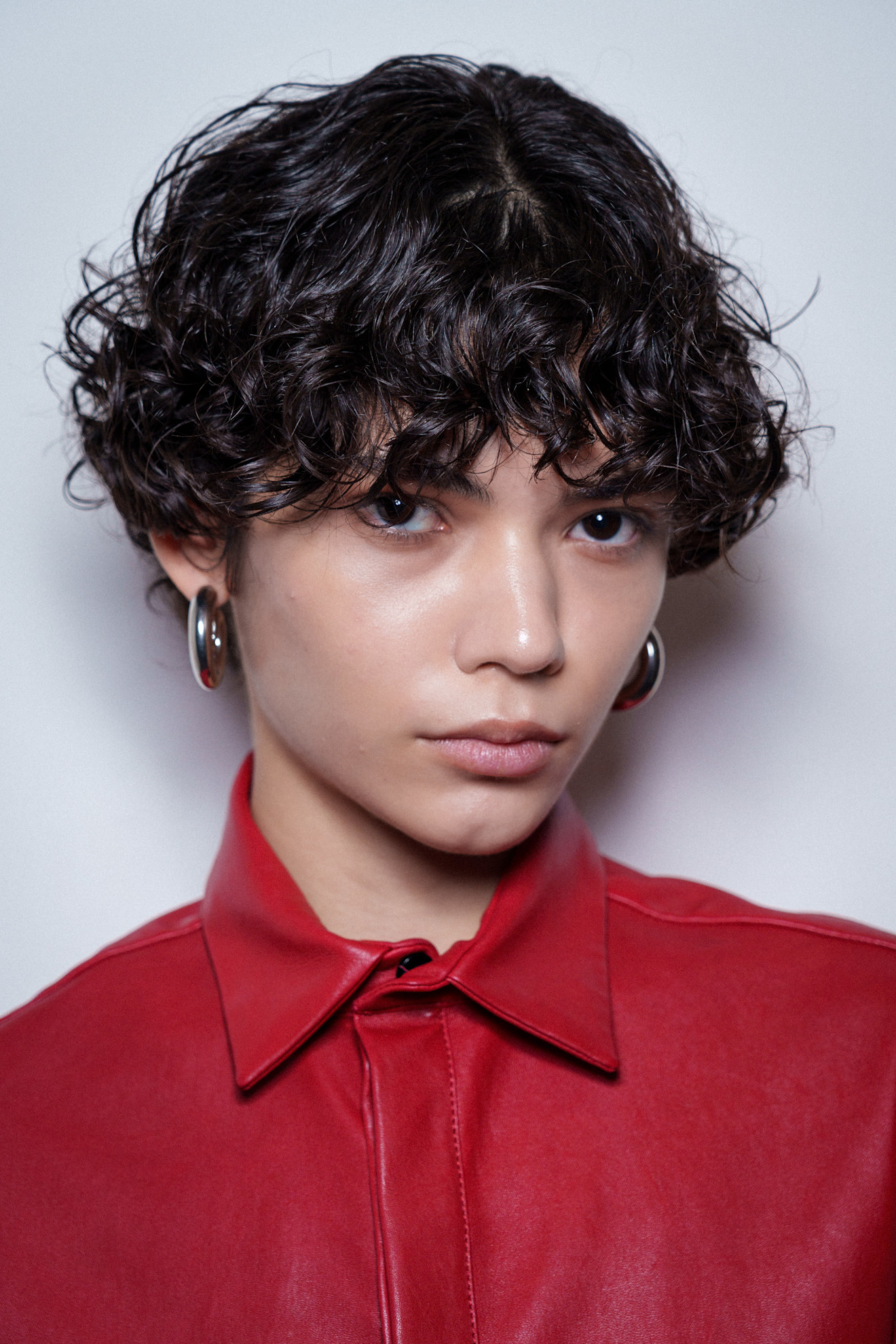 Short Curly Cut With Defined Curly Bangs Short Curly Cut With Defined Curly Bangs — Black Bangs 2027