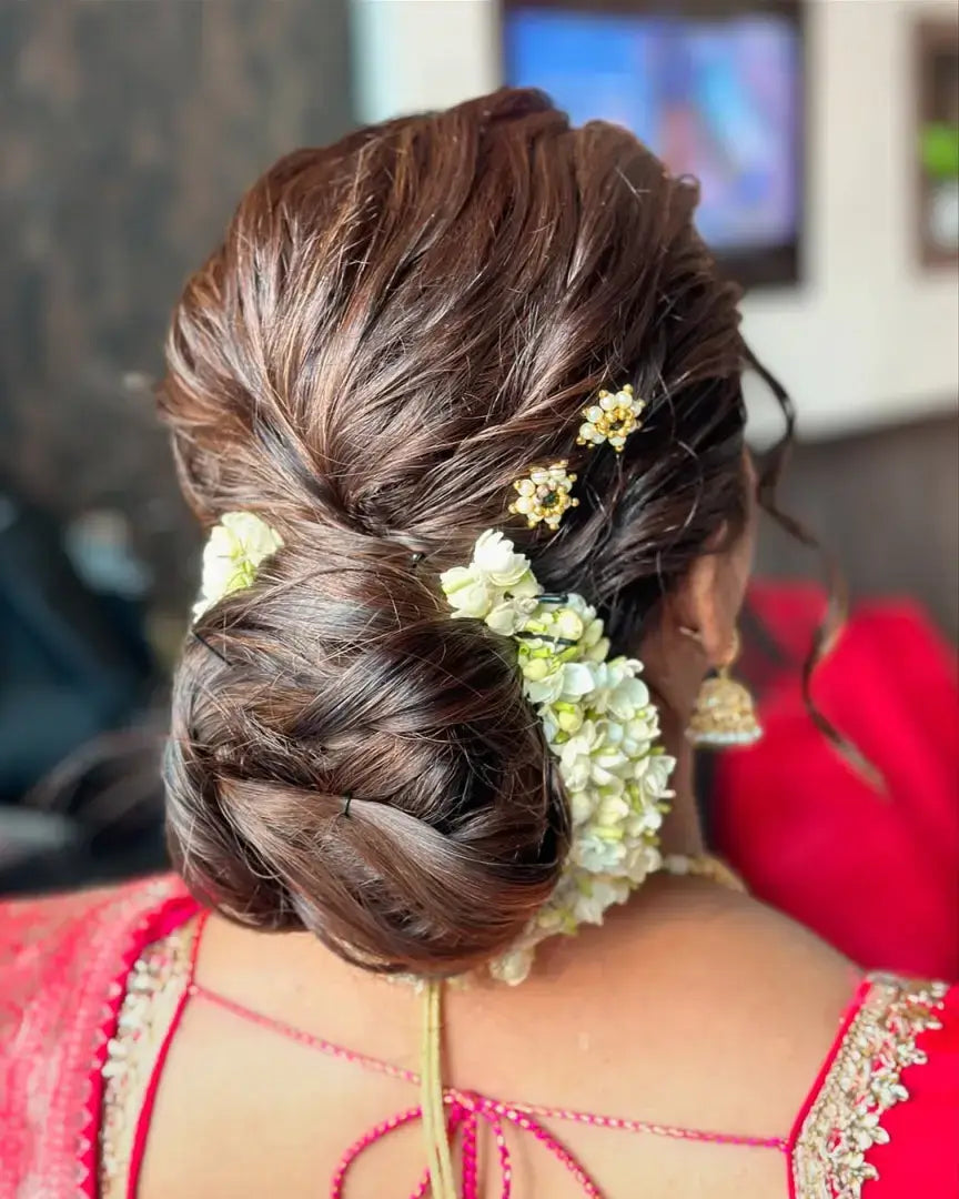 Polished Low Bun with Decorative Pins Polished Low Bun with Decorative Pins — Bun Hairstyles 2027