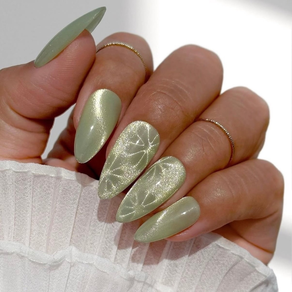 Muted Sage Cat-Eye Stiletto Nails Muted Sage Cat-Eye Stiletto Nails — Spring Acrylic Nails 2027