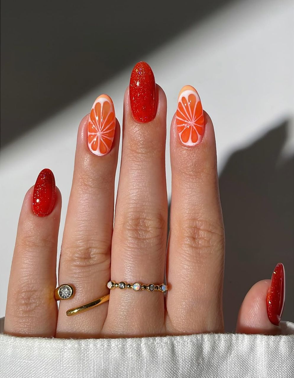 Vibrant Red Glitter and Orange Slices Vibrant Red Glitter and Orange Slices — Summer Nail Trends 2027