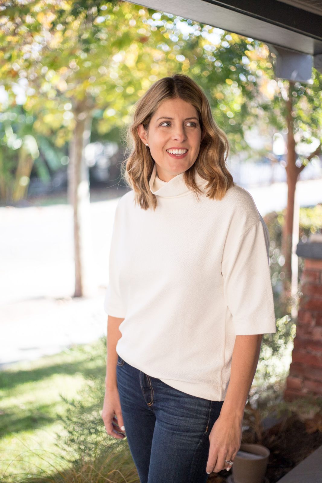 White Textured Short-Sleeve Turtleneck with Dark Jeans — Turtleneck Outfits 2027