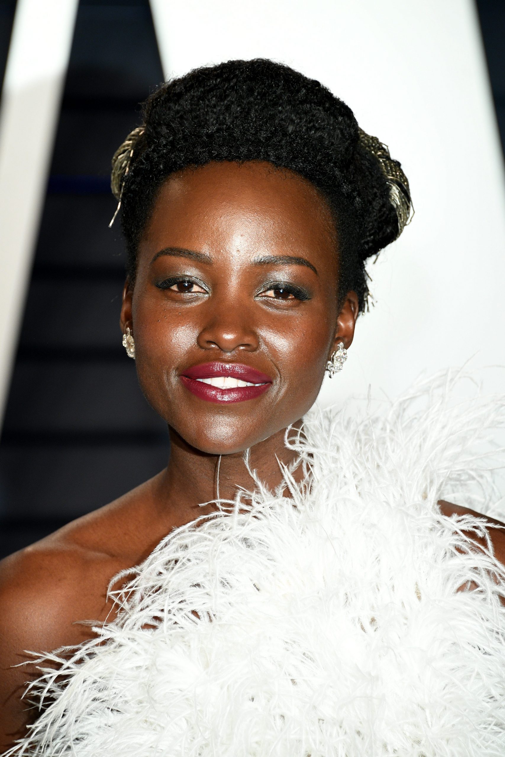 Black Coily Hair High Updo with Metallic Accents Black Coily Hair High Updo with Metallic Accents — Updos 2027 for Short Hair