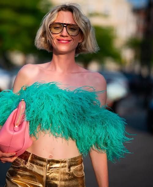 Teal Feather Accent on Off-the-Shoulder Top with Gold Pants Teal Feather Accent on Off-the-Shoulder Top with Gold Pants — Feather Outfits 2027