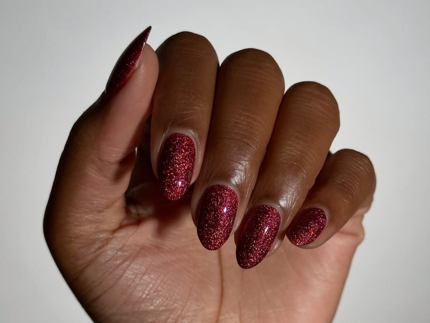 Deep Red Glitter Almonds Deep Red Glitter Almonds — Sparkly Holiday Nails 2026