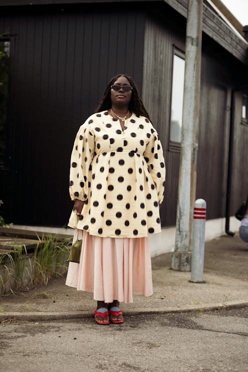 Polka Dot Dress Over Midi Skirt with Red Sandals — Spring Outfits 2027 for Work