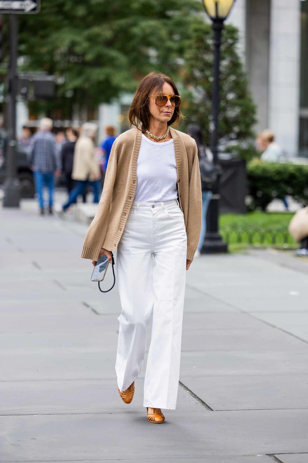 Beige Cardigan Layered Over White Trousers Beige Cardigan Layered Over White Trousers — Sweet 16 Guest Outfits 2027