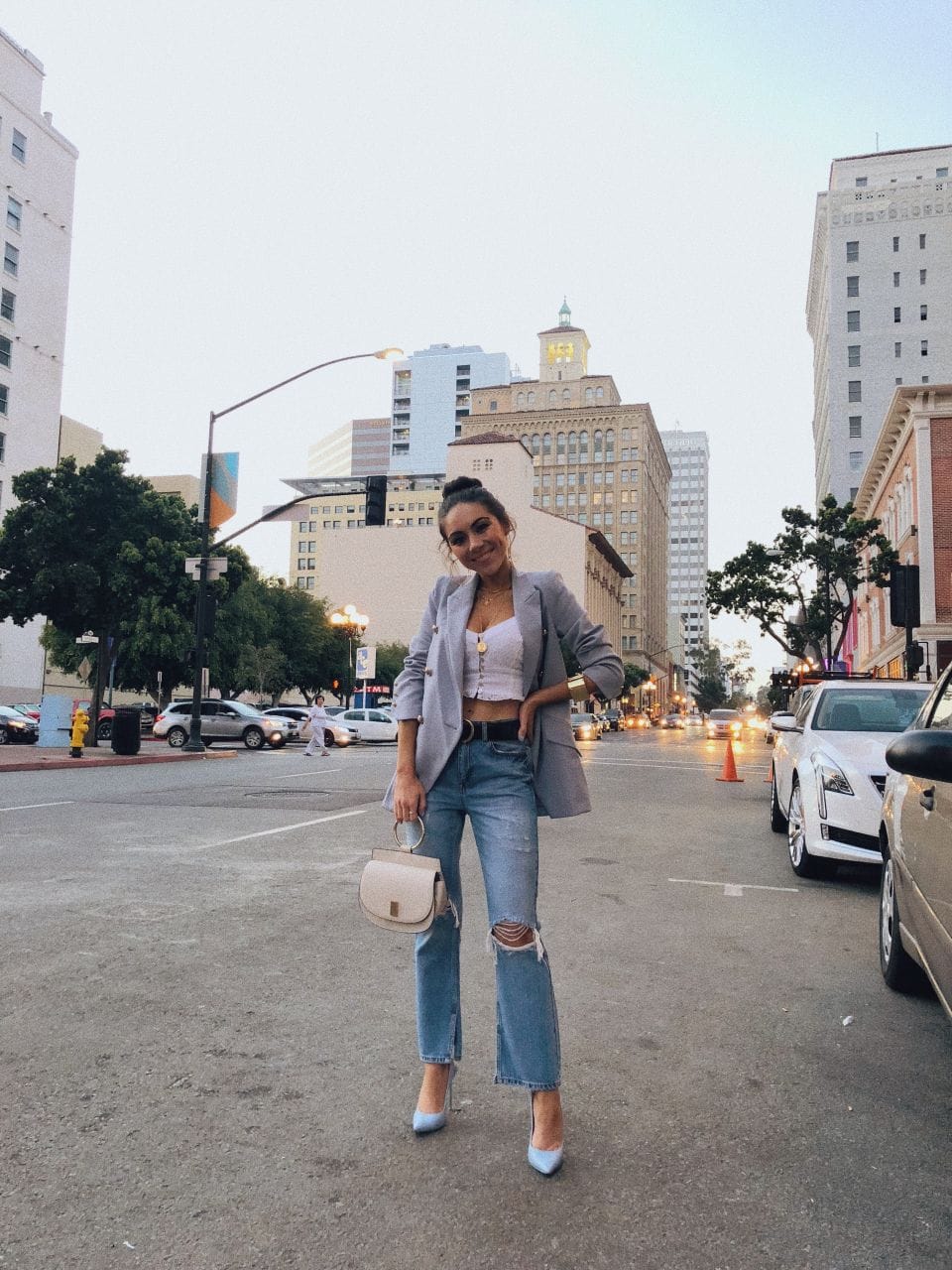 White Crop Top Under Light Grey Blazer with Distressed Jeans White Crop Top Under Light Grey Blazer with Distressed Jeans — Summer Crop Top Outfits 2027