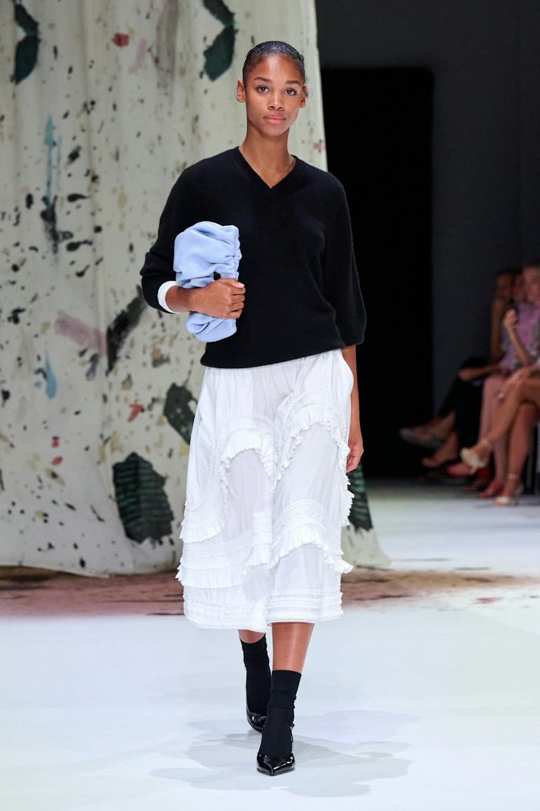 Ruffled Skirt and V-Neck Sweater: Chic Daytime Casual Ruffled Skirt and V-Neck Sweater: Chic Daytime Casual — Spring Outfit Trends 2027