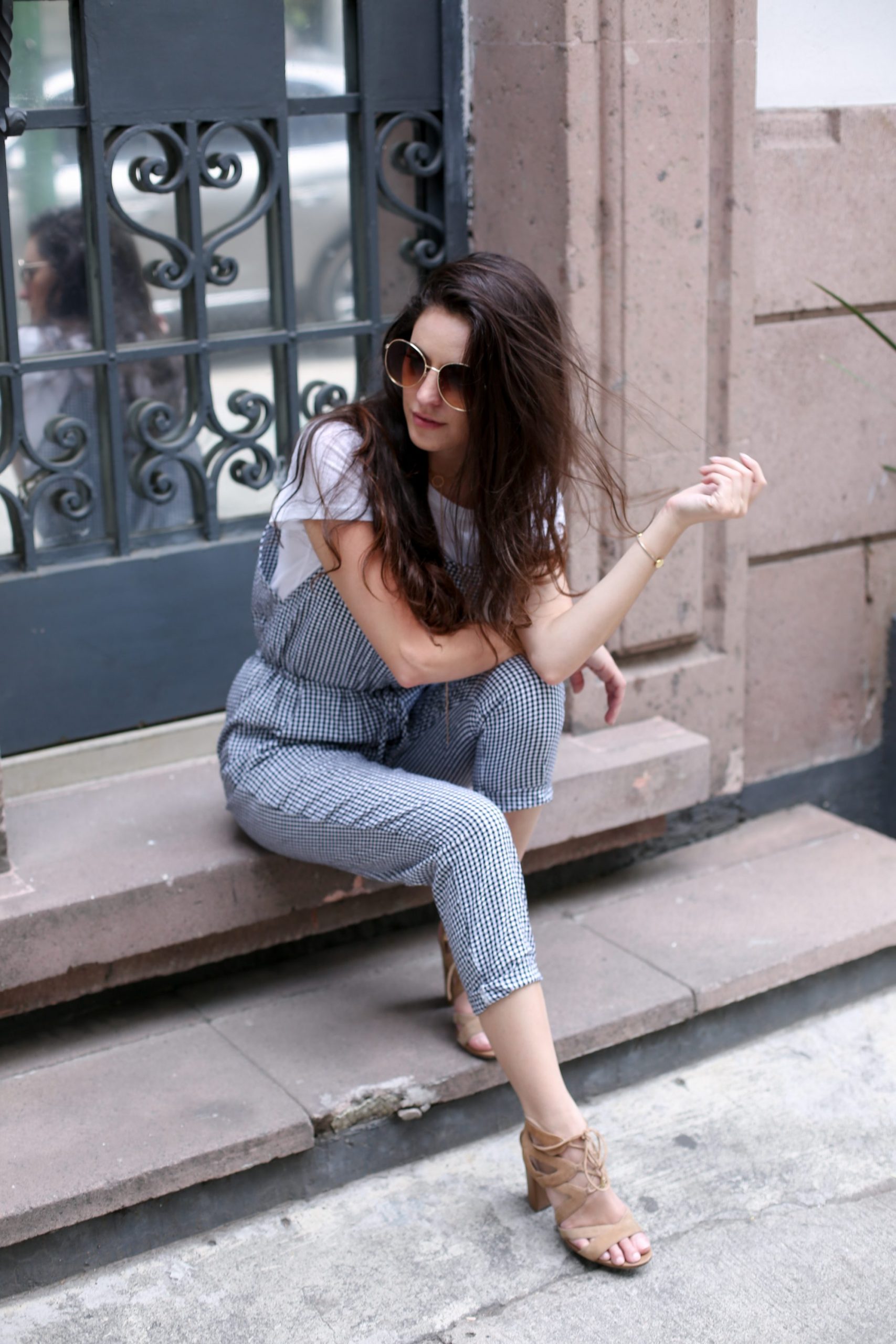 Blue and White Gingham Jumpsuit Layered Over a White T-Shirt Blue and White Gingham Jumpsuit Layered Over a White T-Shirt — Mexico City Outfits 2027