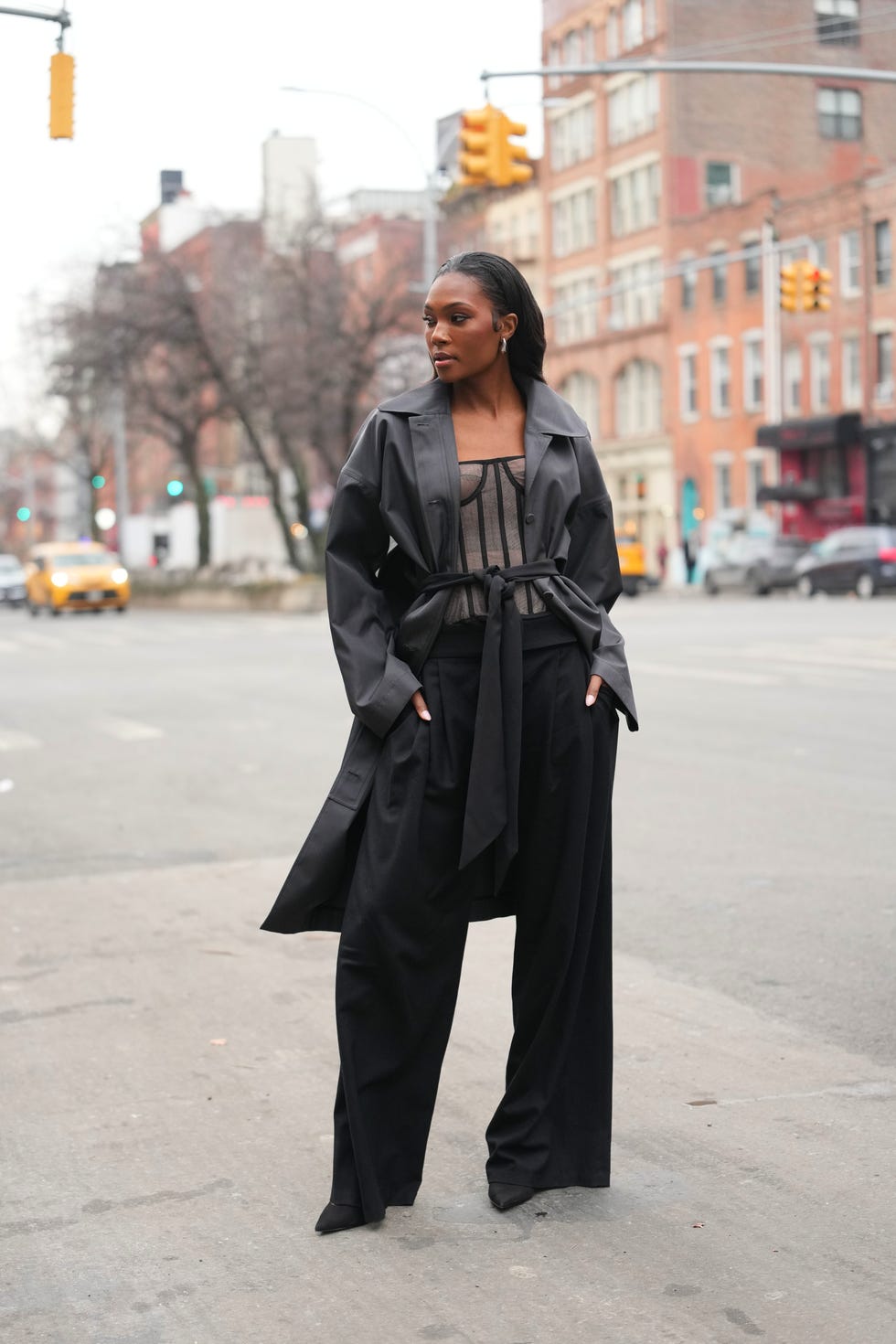 Street Style Sophistication: Corset Top Under an Oversized Trench Street Style Sophistication: Corset Top Under an Oversized Trench — Coquette Corset Top Outfits 2027