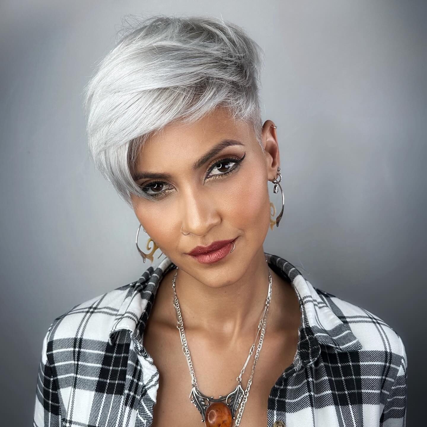 Edgy Spiky Pixie With Lightened Tips Edgy Spiky Pixie With Lightened Tips — Gray Blending Pixie 2027