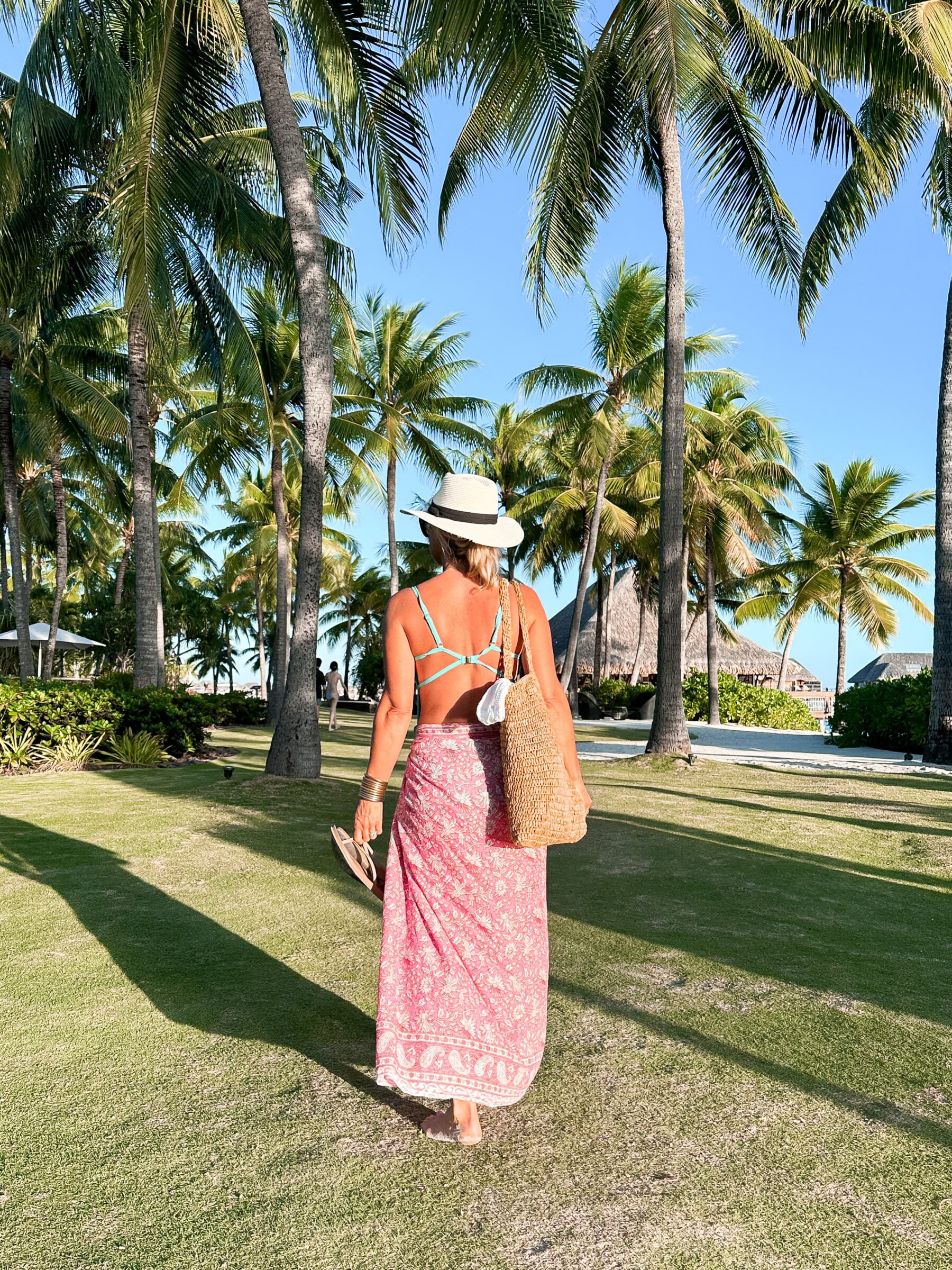 Beach Day Breeze: Blue Bikini and Pink Sarong Beach Day Breeze: Blue Bikini and Pink Sarong — Bora Bora Outfits 2027